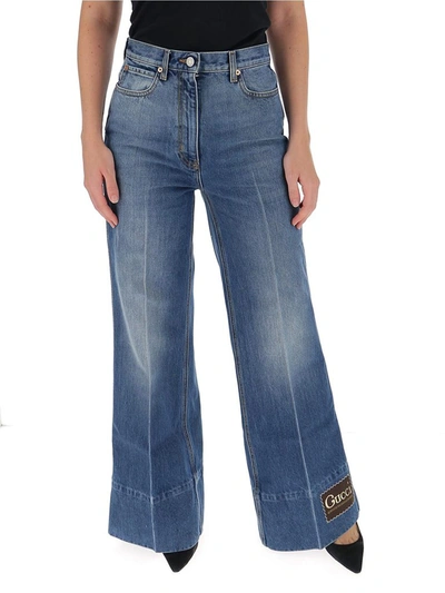 Shop Gucci Label Wide Leg Jeans In Blue