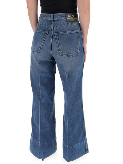 Shop Gucci Label Wide Leg Jeans In Blue