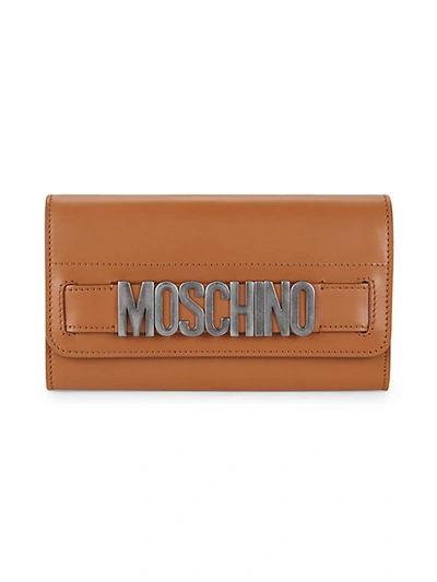 Shop Moschino Logo Leather Continental Wallet In Tan