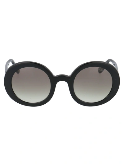 Shop Miu Miu 0mu 06us Sunglasses In 1ab0a7 Black