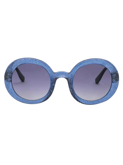 Shop Miu Miu 0mu 06us Sunglasses In 1272j1 Transparent Divisa Glitter