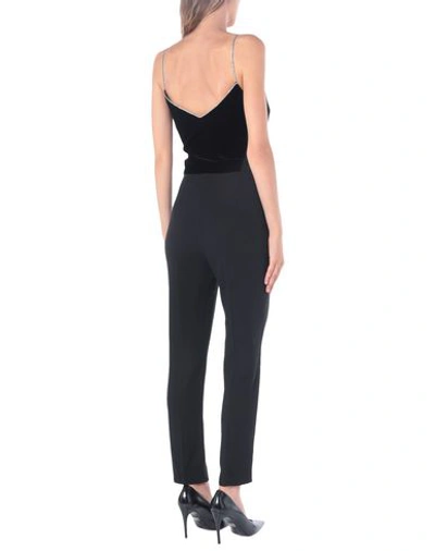 Shop Givenchy Jumpsuit/one Piece In Black