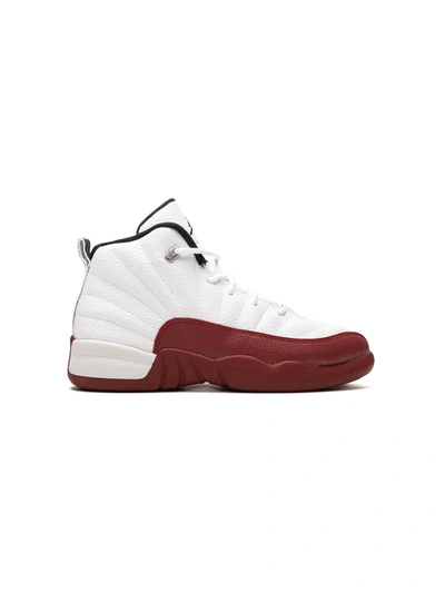 Shop Nike Jordan 12 Retro Sneakers In White