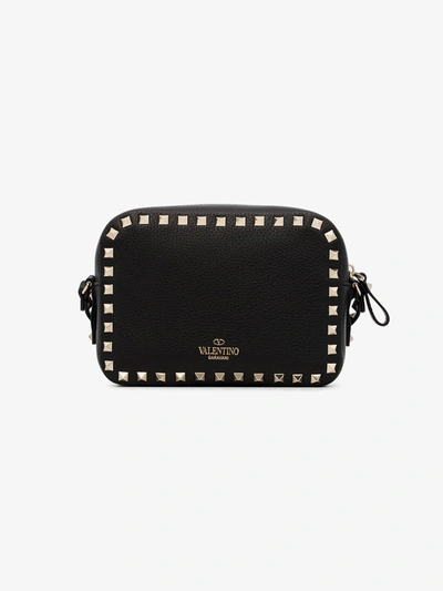 Shop Valentino Rockstud Leather Crossbody Bag In Black