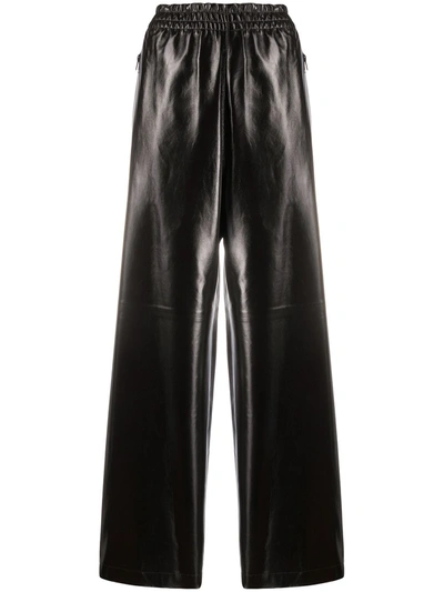 Shop Bottega Veneta Leather Trousers In Black
