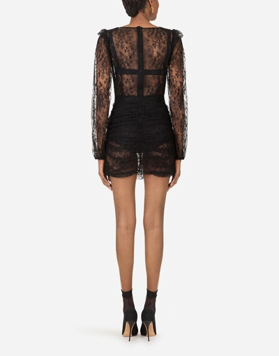 Shop Dolce & Gabbana Galloon Lace Mini Dress With Draped Detailing In Black