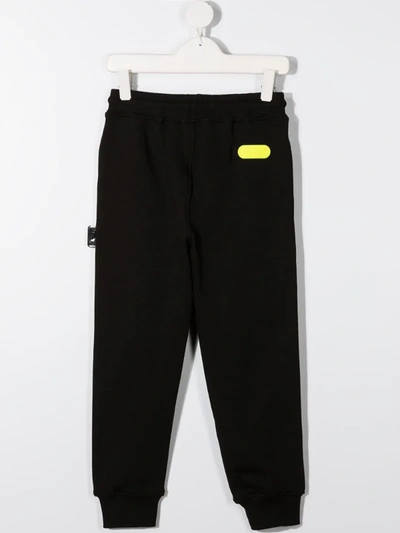 Gcds Yellow Details Tracksuit Pants In Black In Black