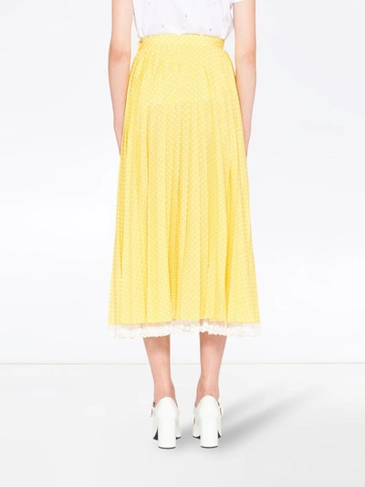 Shop Miu Miu Pleated Midi Skirt In Yellow