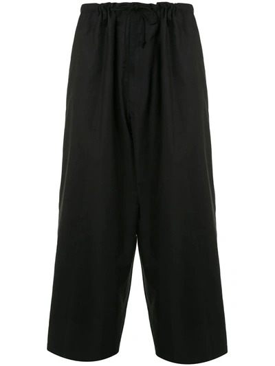 Shop Yohji Yamamoto Gathered-waist Cotton Trouses In Black