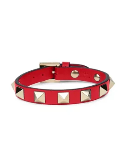 Shop Valentino Rockstud Leather Bracelet In Rouge