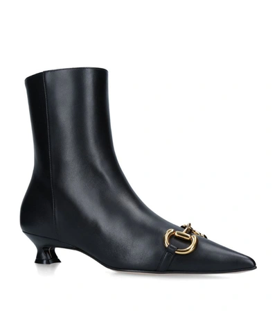 Shop Gucci Leather Deva Ankle Boots 35
