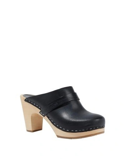 Shop Swedish Hasbeens Mules And Clogs In Black