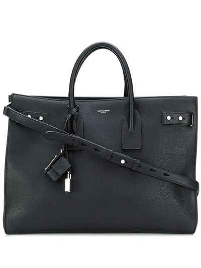 Shop Saint Laurent Leather Slim Bag In Black