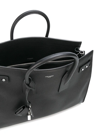 Shop Saint Laurent Leather Slim Bag In Black