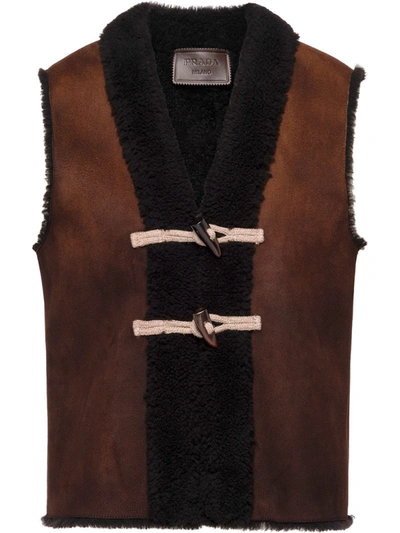 Shop Prada Sheepskin Toggle Vest In Brown
