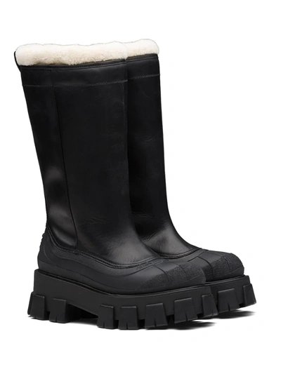Shop Prada Monolith Shearling-lined Boots In Black