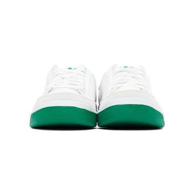 Shop Adidas Originals White And Green Rod Laver Sneakers In Wht/grn