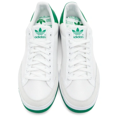 Shop Adidas Originals White And Green Rod Laver Sneakers In Wht/grn