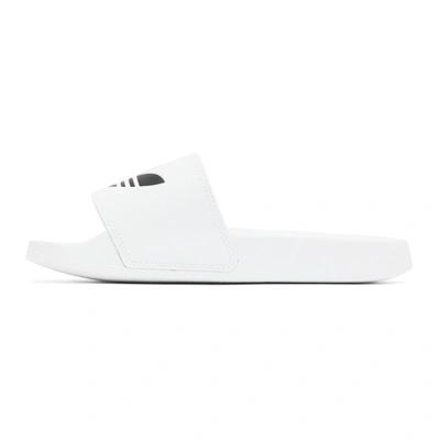 Shop Adidas Originals White Adilette Lite Pool Slides In Wht/blk