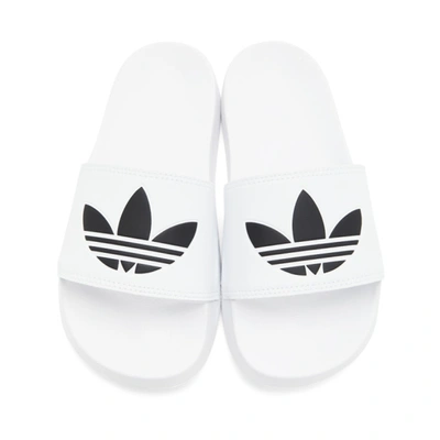 Shop Adidas Originals White Adilette Lite Pool Slides In Wht/blk