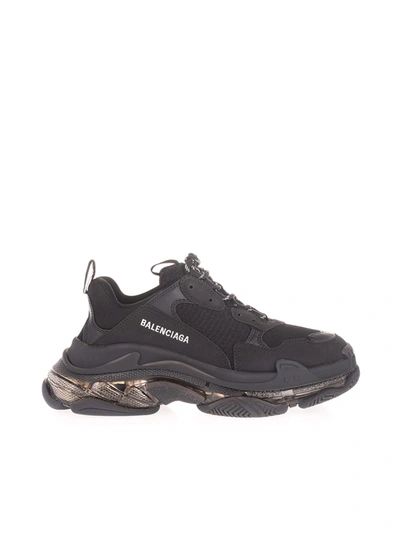 Shop Balenciaga Triple S Sneakers In Black