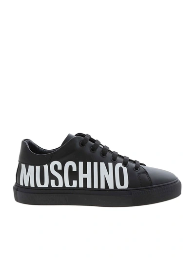 Shop Moschino Maxi Logo Print Sneakers In Black