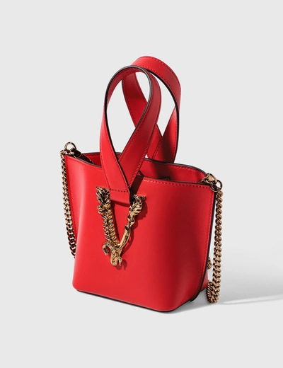 Shop Versace Virtus Bucket Bag In Red
