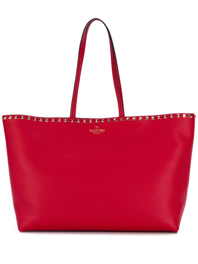 Shop Valentino Rockstud Leather Tote Bag In Red