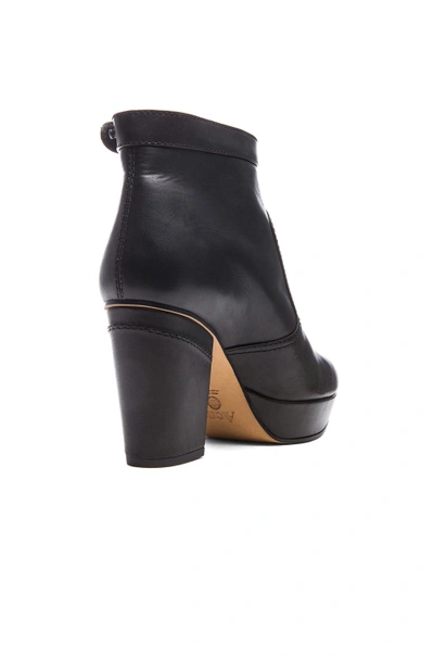 Shop Acne Studios Track Leather Booties In Black