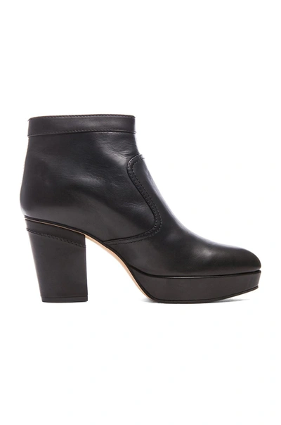 Shop Acne Studios Track Leather Booties In Black