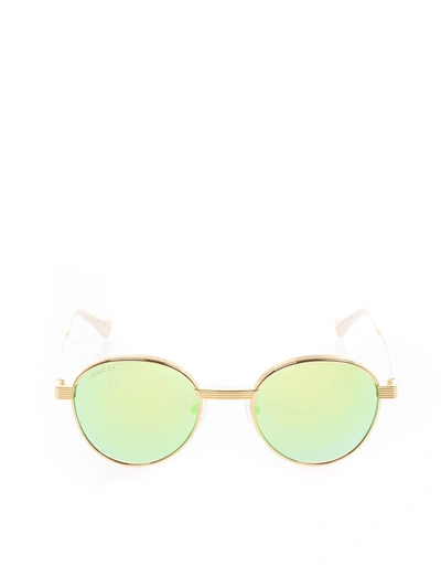 Shop Gucci Round Sunglasses In Gold And Light Yellow Color