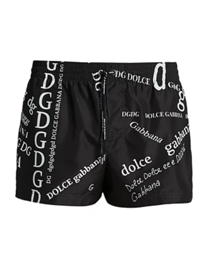 Shop Dolce & Gabbana Dg Logo Swim Trunks In Black