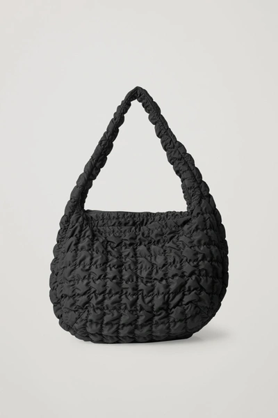 Shop Cos Oversized Quilted Crossbody In Black