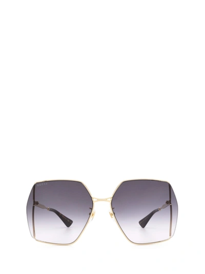 Shop Gucci Gg0817s Gold Sunglasses