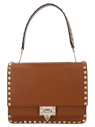 Shop Valentino Rockstud Bag In Marrone