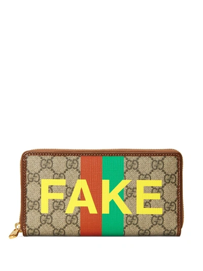 Shop Gucci Fake Not Wallet In Beige