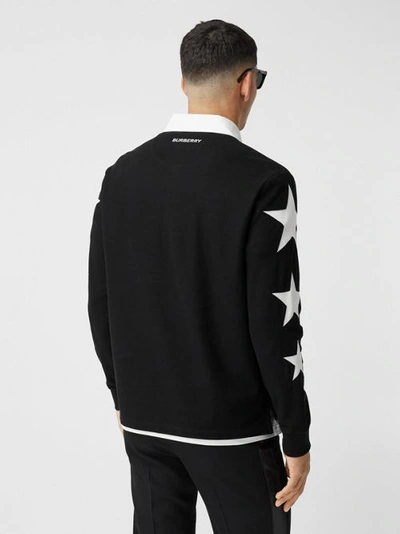 Shop Burberry Long-sleeve Star Motif Cotton Piqué Polo Shirt In Black