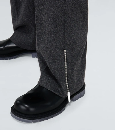 Shop Raf Simons Wide-fit Pants With Ankle Zippers In Grey