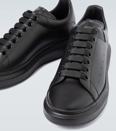 Alexander Mcqueen Black Sneakers With Logo Lettering On The Rear And Oversize Rubber Sole In Leather In Black