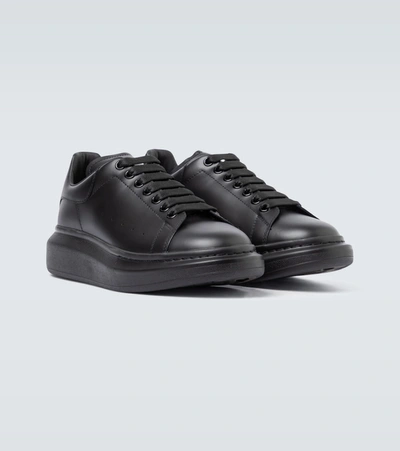Alexander Mcqueen Black Sneakers With Logo Lettering On The Rear And Oversize Rubber Sole In Leather In Black