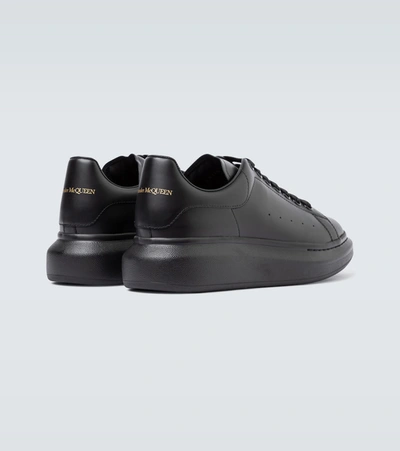 Alexander Mcqueen Black Sneakers With Logo Lettering On The Rear And Oversize Rubber Sole In Leather In Black