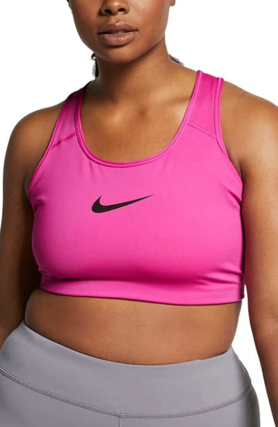 Shop Nike Dry Swoosh Bold Sports Bra In Active Fuchsia/ Black