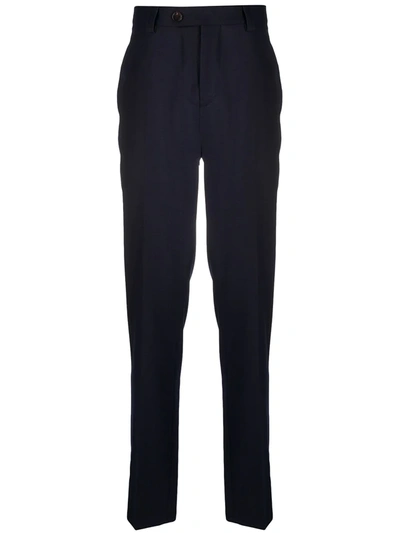 Shop Brunello Cucinelli Tapered Wool Trousers In Blue