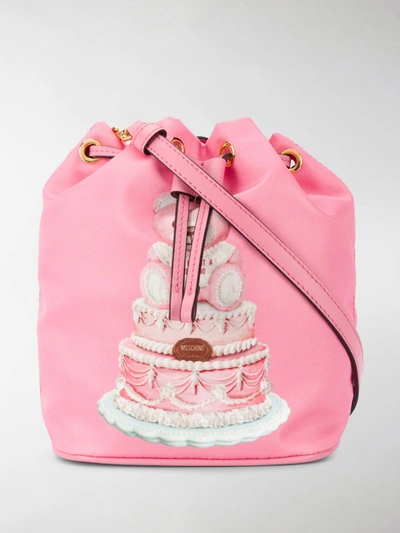 Shop Moschino Graphic Print Bucket Bag In Pink