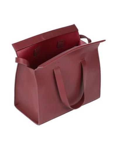 Shop Aesther Ekme Handbags In Brick Red