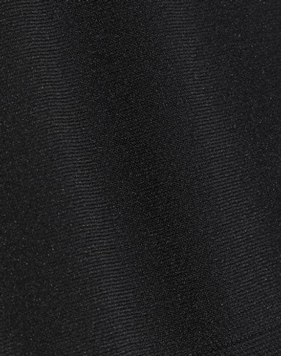 Shop Yummie Sleeveless Undershirts In Black