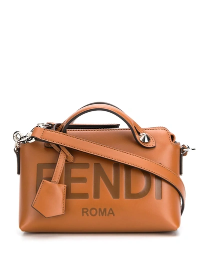 Shop Fendi Embossed Logo Crossbody Bag In Brown