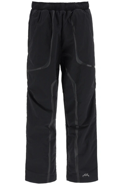Shop A-cold-wall* Nylon Pants With Logo In Black (black)