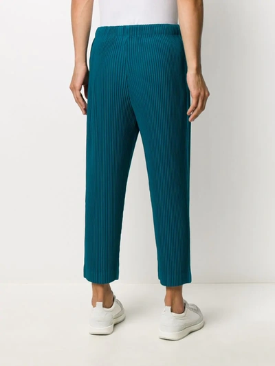 Shop Issey Miyake Cropped Pleated Trousers In Blue