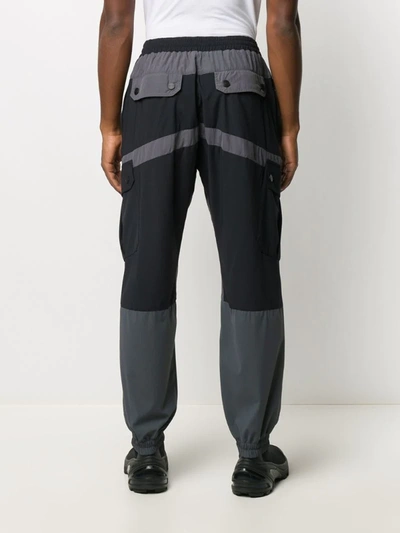 Shop White Mountaineering Colour Block Utility Trousers In Black